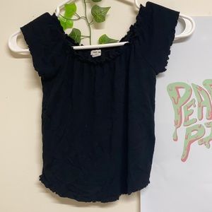 Women’s black off the shoulder shirt.